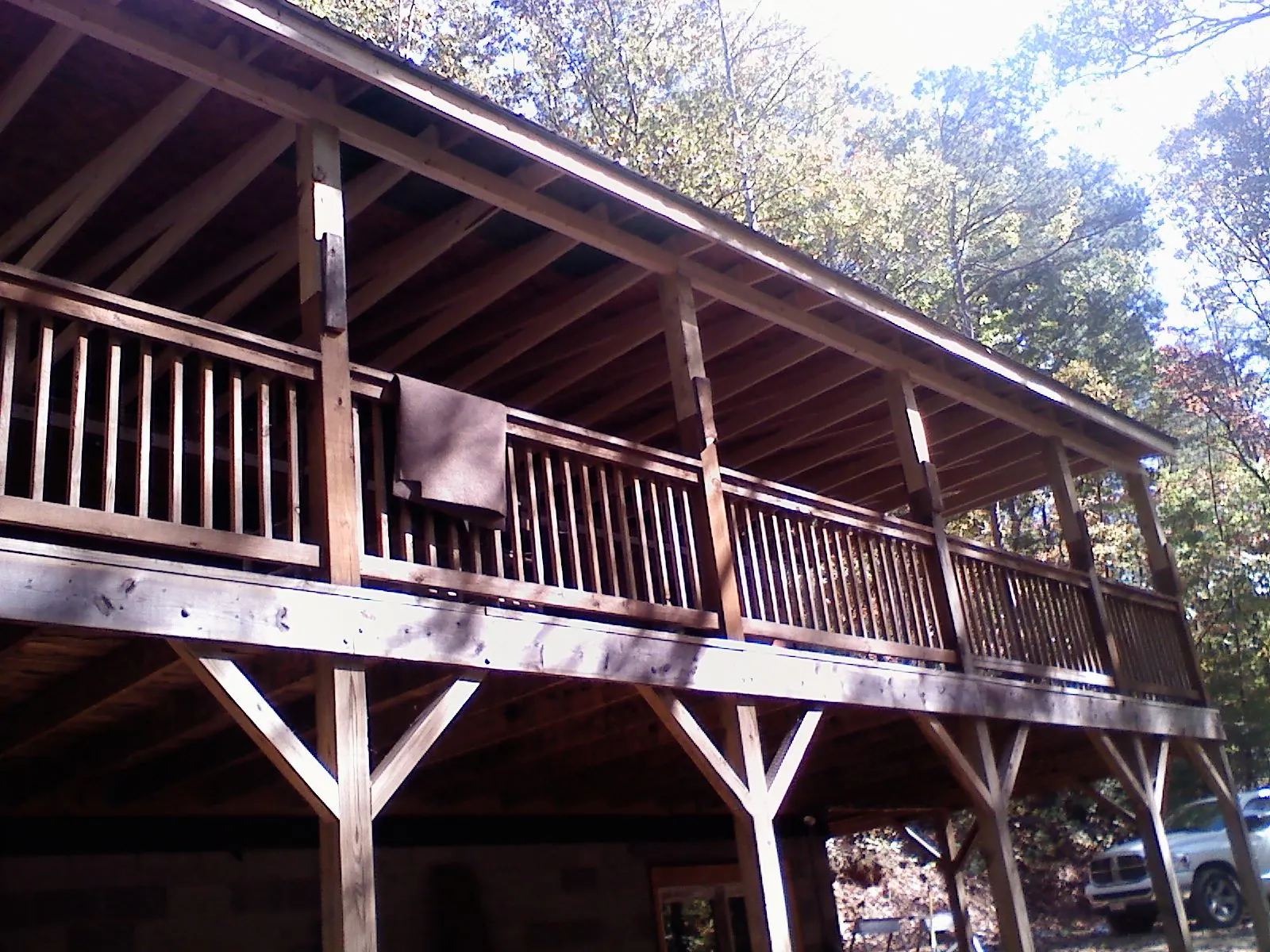 Timber framing under a new elevated porch and deck — Roof Leak Repair in Clarks Grove by Roofing Brothers